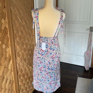 BRAND NEW WITH TAGS FLORAL BACK LESS DRESS